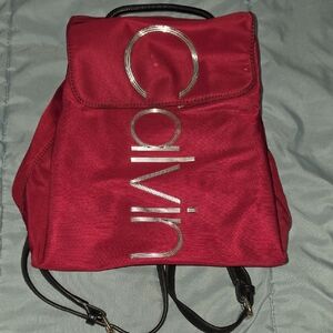Calvin Klein Burgundy Backpack with Silver Logo